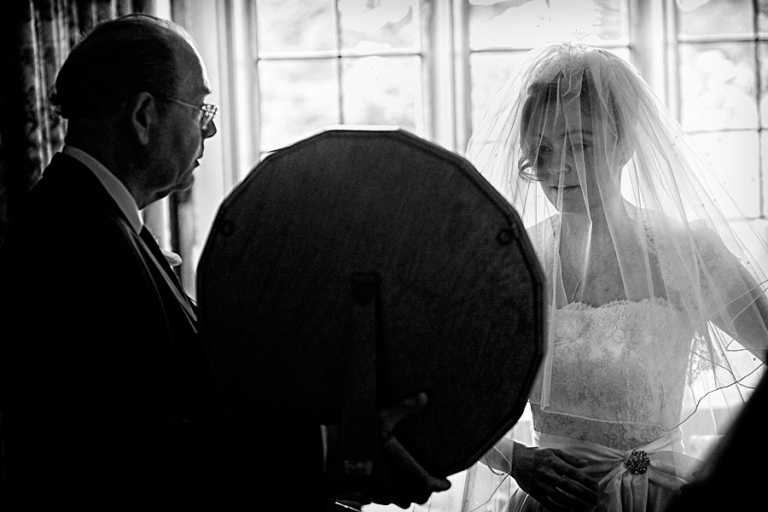 bride getting ready at Fawsley Hall in Northamptonshire