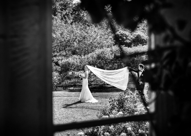 bride showing off her veil