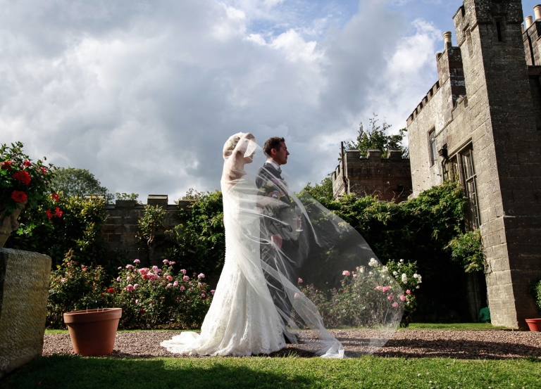 wadhust castle wedding photographer, the couple in the garden