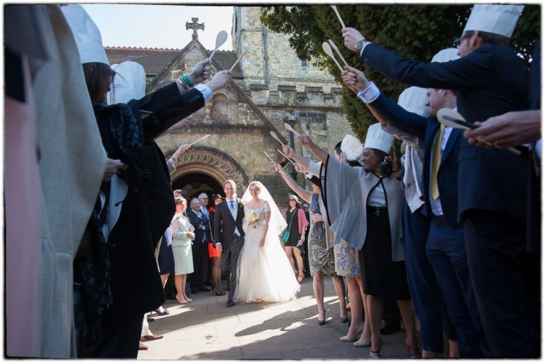 the couple leaving St Peter's church in Petersfield