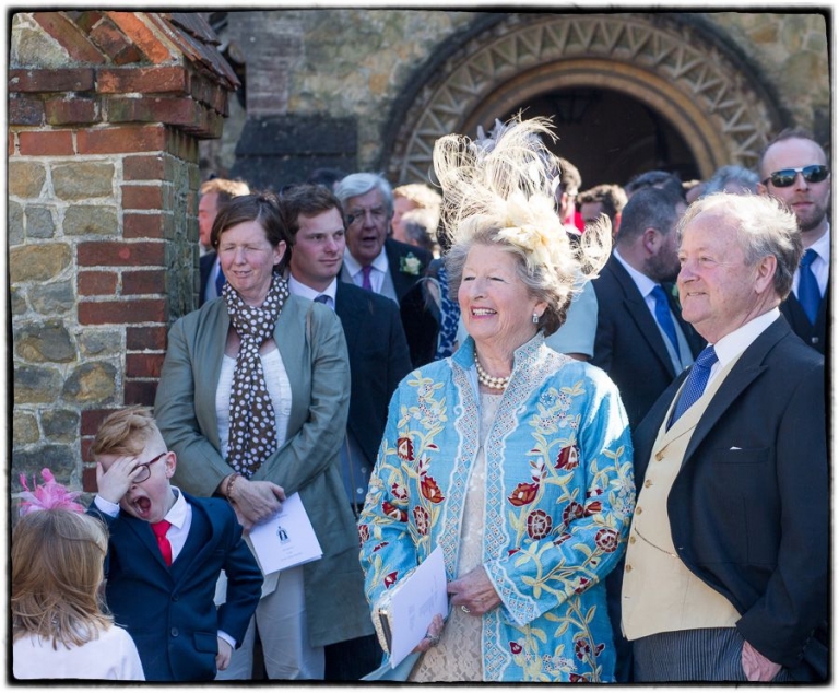 wedding guests, all too much for one young guest