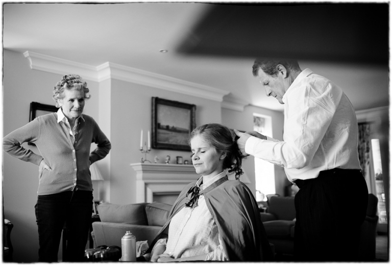 bride's hair being styled