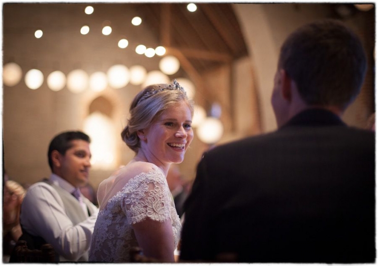 the bride smiling at a tithe barn wedding