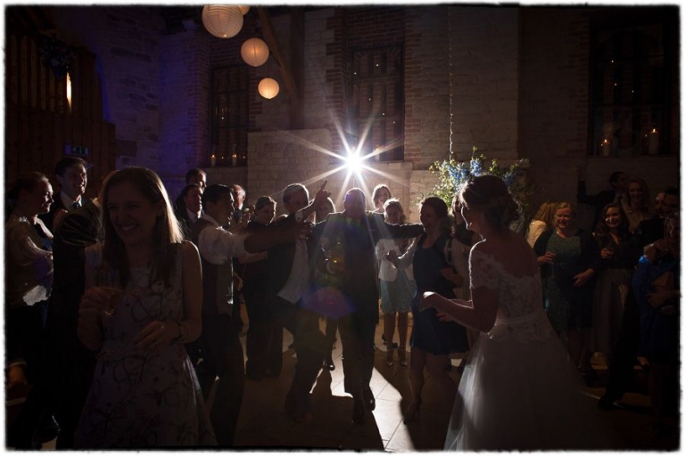 dancing at the tithe barn for a wedding