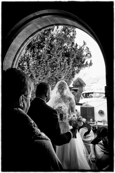 bride arriving at St Peter's church in Petersfield