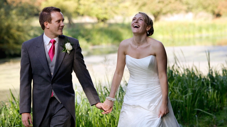 a very smiley and happy bride on her wedding day