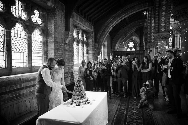 cutting the cake at St Stephen's Trust in London