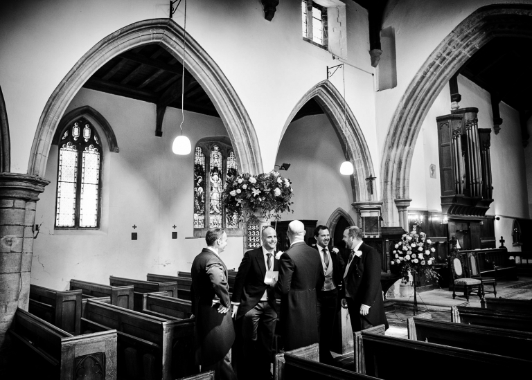 the groom in the church, Peterborough wedding photography