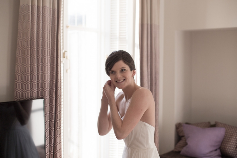 the bride getting ready at cowley manor