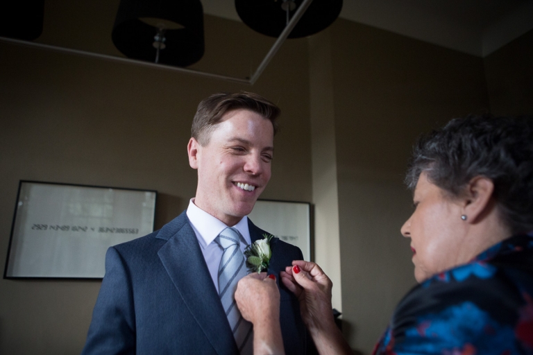 groom with his buttonhole
