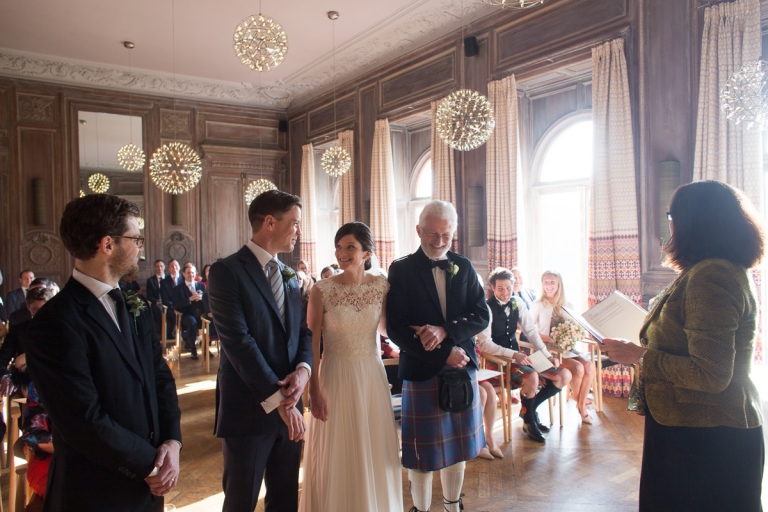 wedding ceremony taking place at cowley manor