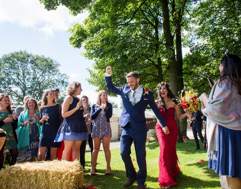 outdoor wedding ceremony at Hamps Hall in The Peak District