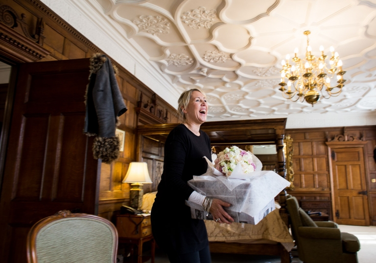 the florist arriving with the bouquet