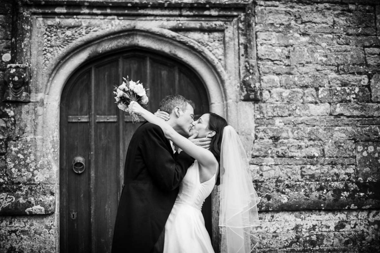 a kiss outside the church