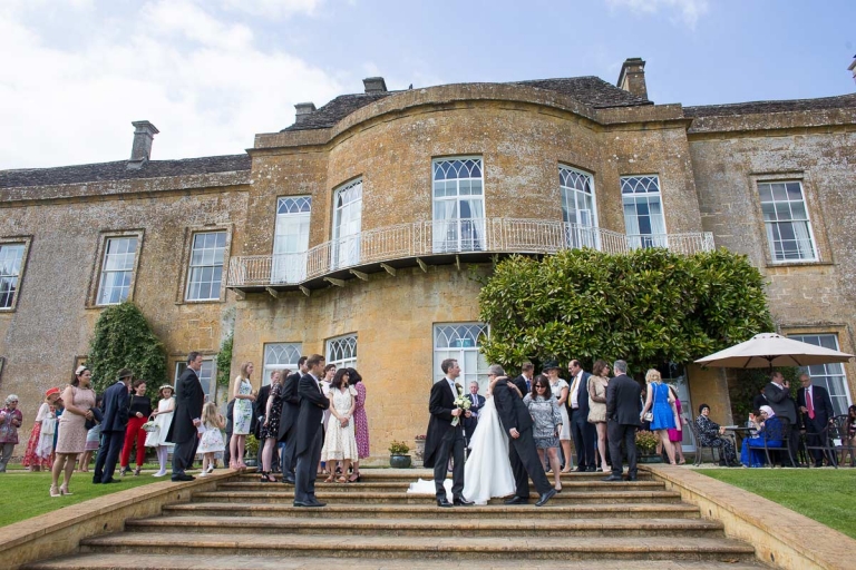 on the steps at North Cadbury Court wedding