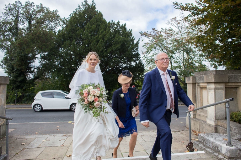 The bride Gina arrives at the church