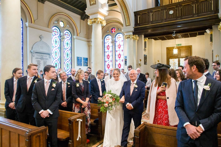 The groom sees his bride for the first time