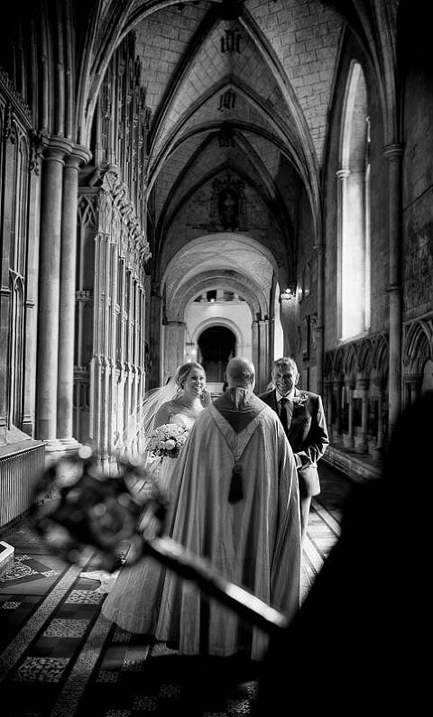 St Albans Cathedral wedding photographer, the bride arriving for the ceremony in the cathedral. 