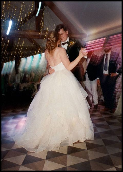 35mm film wedding photography of the first dance, taken with a Leica M4-P using Kodak Portra film. 