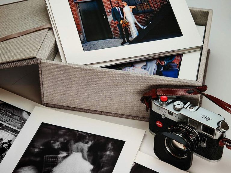 Print box with mounted prints from my analogue 35mm wedding photography, also showing a Leica M4-P camera.