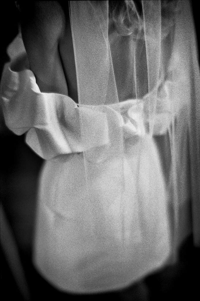 35mm film photograph of the back of the brides dress
