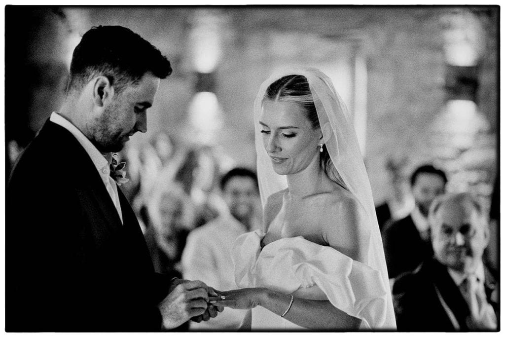 wedding ceremony ring exchange photographed on 35mm film